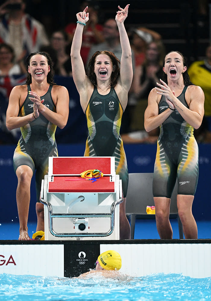 Brianna Throssell, Mollie O'Callaghan and Lani Pallister, pictured here celebrating after Ariarne Titmus touched the wall.