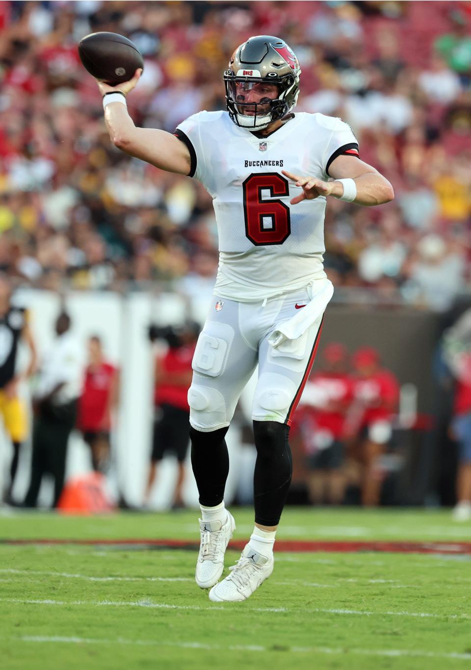 Tampa Bay Buccaneers quarterback Baker Mayfield throws the ball against the Pittsburgh Steelers during the first half of Friday night's preseason game.