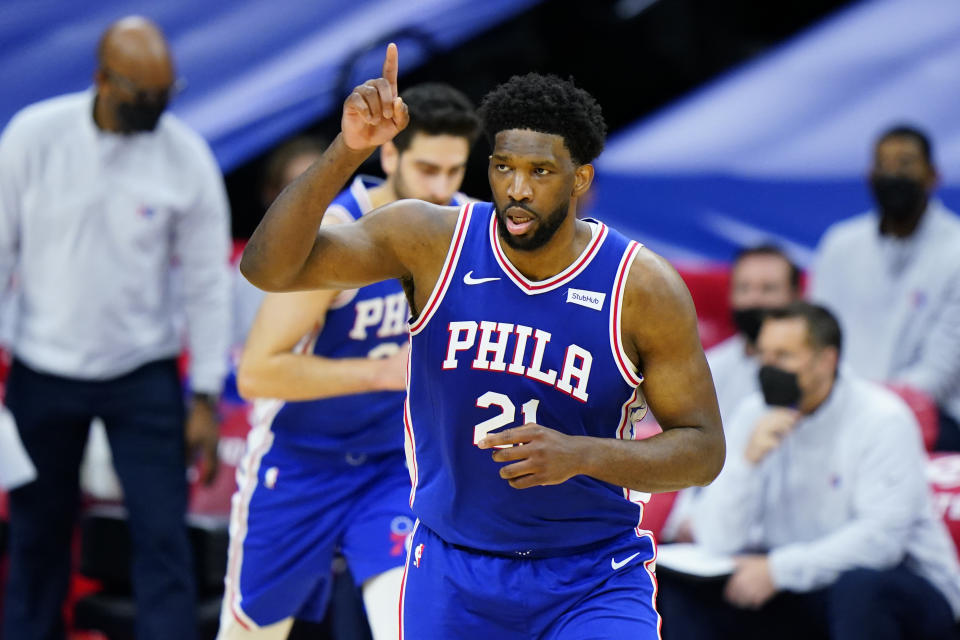 Philadelphia 76ers' Joel Embiid reacts after a basket during the first half of an NBA basketball game against the Indiana Pacers, Monday, March 1, 2021, in Philadelphia. (AP Photo/Matt Slocum)