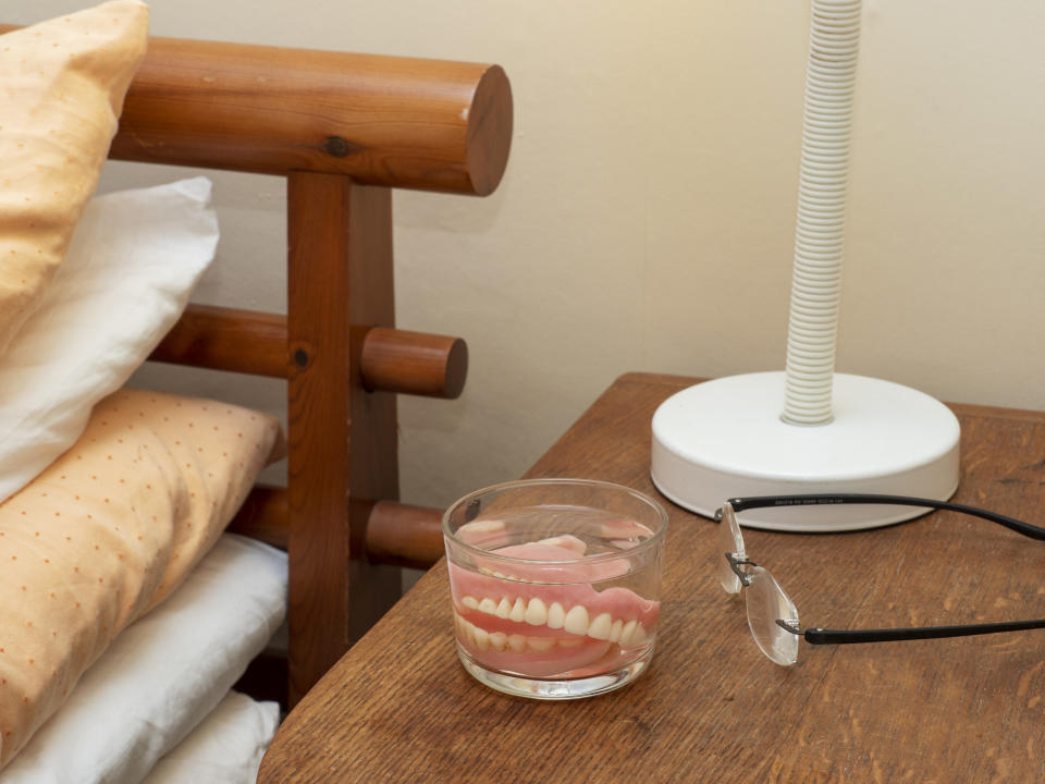 Fake teeth on a night stand