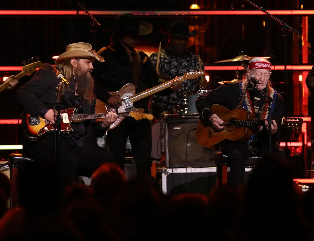 Chris Stapleton, left, and Willie Nelson perform during the Rock & Roll Hall of Fame Induction Ceremony on Nov. 3, 2023 at Barclays Center in New York.