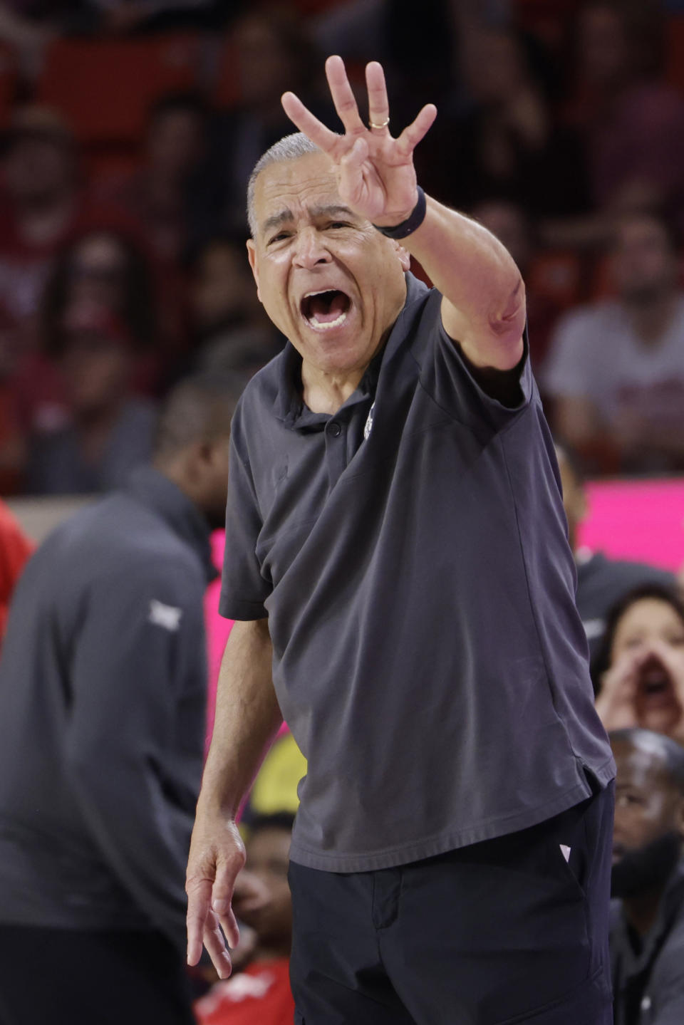 Houston coach Kelvin Sampson shouts from the sideline during the second half of the team's NCAA college basketball game against Oklahoma on Saturday, March 2, 2024, in Norman, Okla. (AP Photo/Garett Fisbeck)