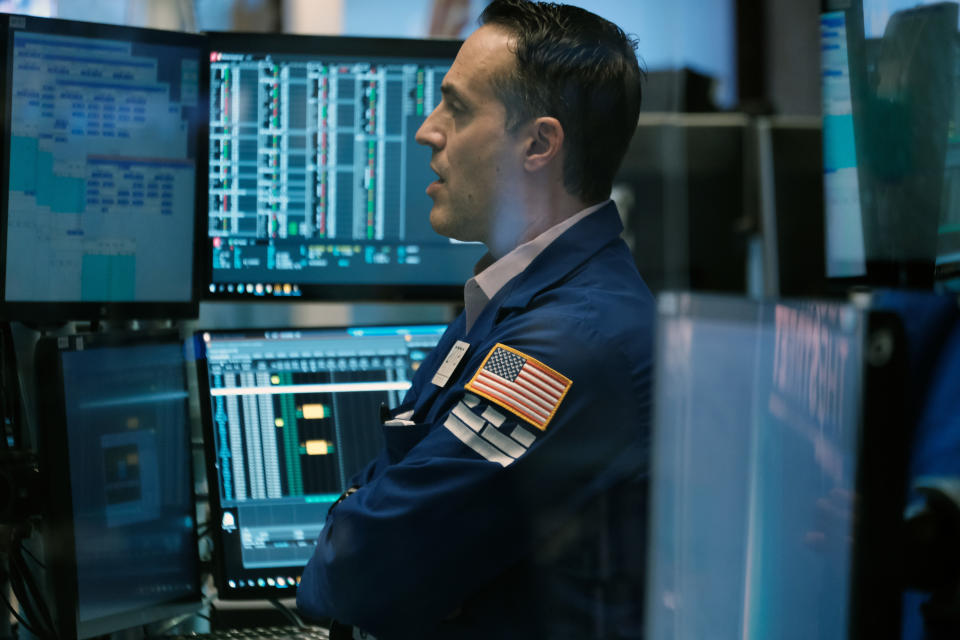 NEW YORK, NEW YORK - MARCH 16: Traders work on the floor of the New York Stock Exchange (NYSE) on March 16, 2022 in New York City. The Dow started off the day in positive territory, extending yesterday&#39;s rally.  (Photo by Spencer Platt/Getty Images)