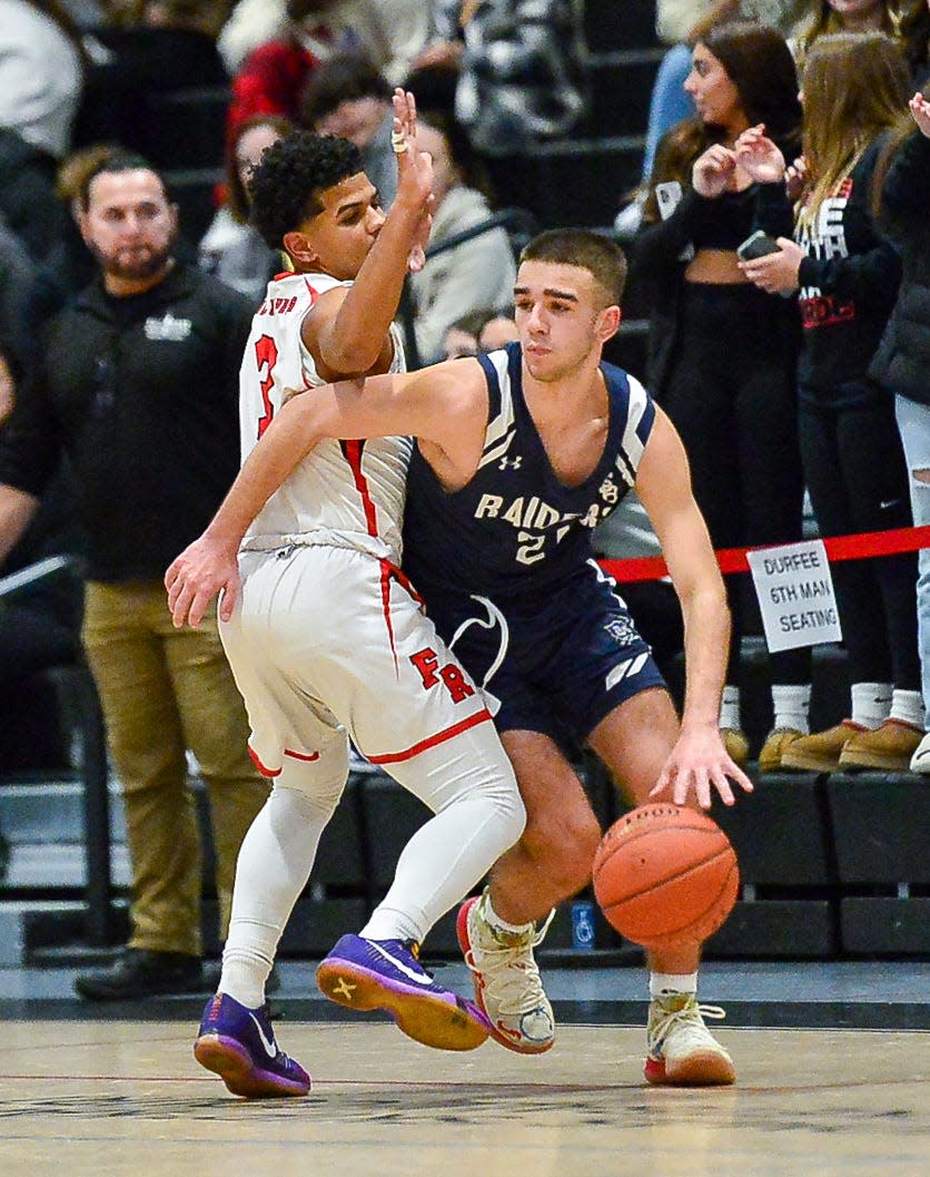 Durfee’s Jeyden Espinal defends Berkley’s Mason Medeiros during a recent game.