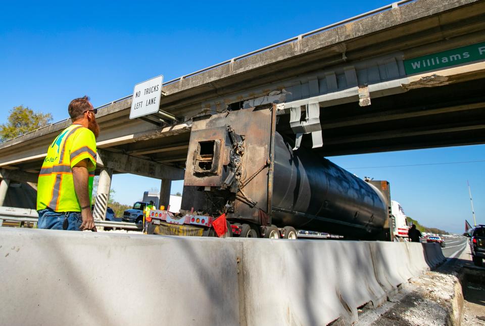 This was the scene Wednesday morning on northbound I-75, where a truck hauling heavy equipment hit the overpass at SW 66th Street (Williams Road.)