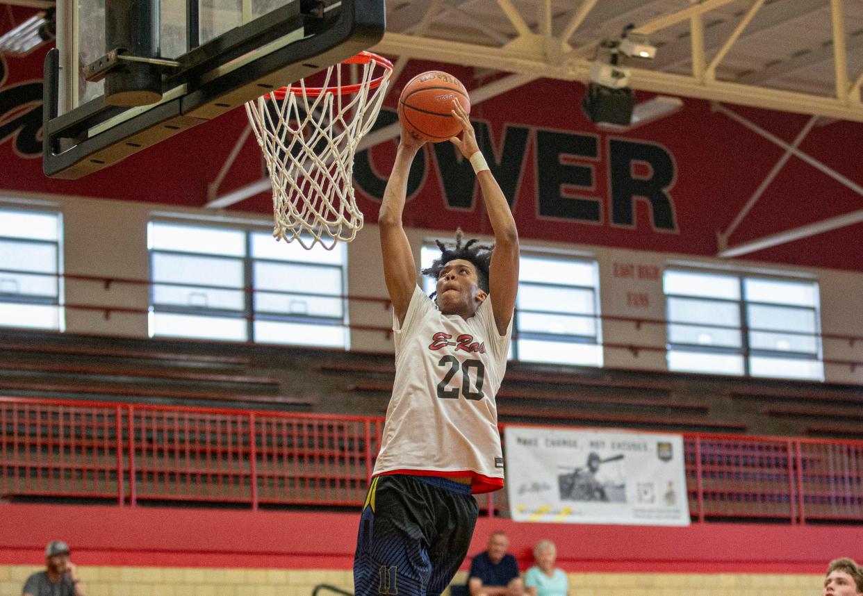 Matthew Hoarde, shown dunking against Sycamore in Monday's first round, was East's leading scorer as the E-Rabs went 4-0 in the tournament to win the East Summer League title.