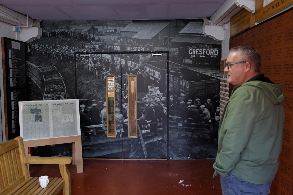 Michael Hett – a Wrexham fan, poet and musician – looks around the memorial to the 266 men killed in the 1934 Gresford Colliery disaster at the Wrexham Miners Project