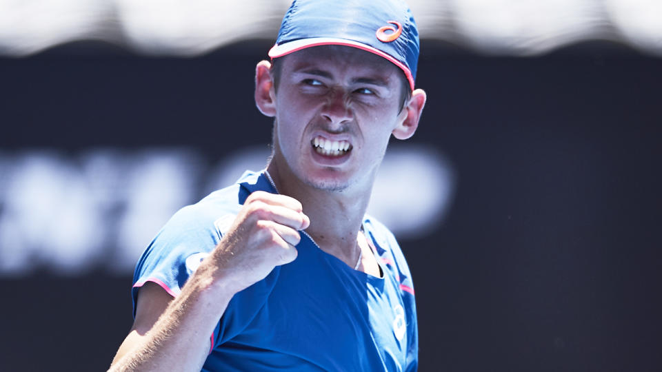 Alex De Minaur celebrates. (Photo by Brett Hemmings/Getty Images)