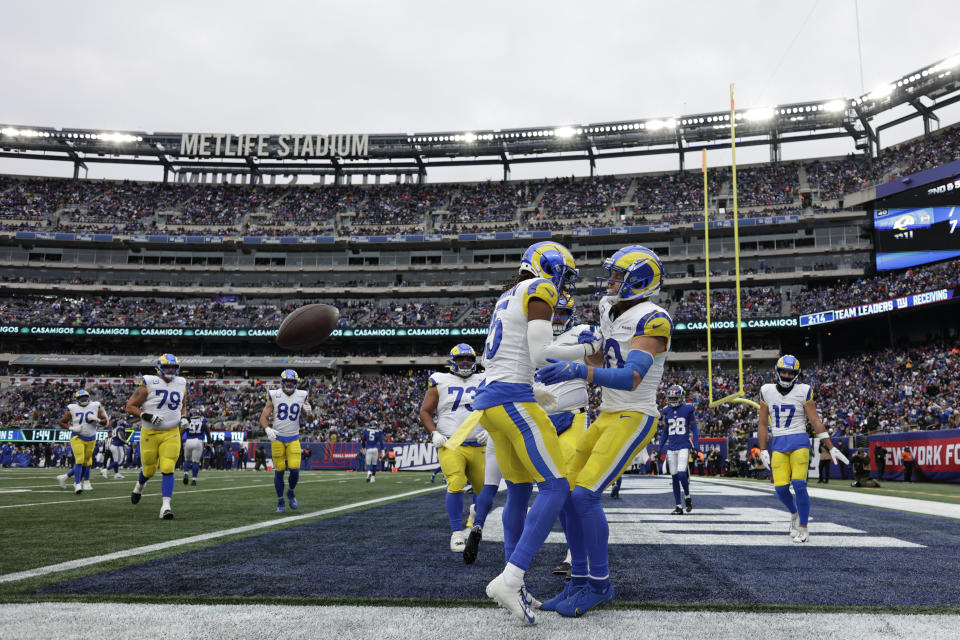 Los Angeles Rams wide receiver Cooper Kupp celebrates with his teammates after running in a touchdown during the first half an NFL football game against the New York Giants, Sunday, Dec. 31, 2023, in East Rutherford, N.J. (AP Photo/Adam Hunger)