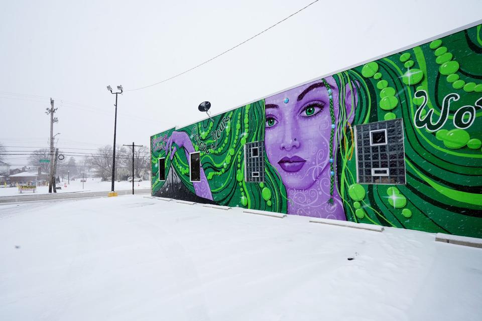 "Color Your World Green" by artists Michael Boudreault and Chris McDaniels, located at 3045 Sullivant Ave.
