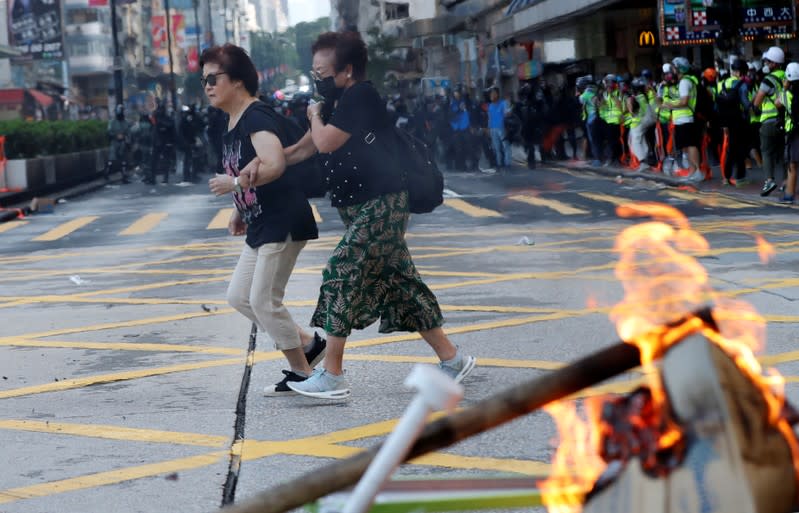 Anti-government demonstrators attend a protest march in Hong Kong