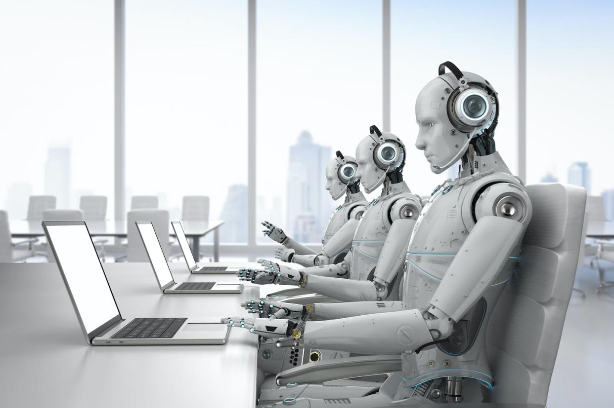 Could AI be your next colleague – or replacement? <a href="https://www.gettyimages.com/detail/photo/robot-call-center-royalty-free-image/943557584" rel="nofollow noopener" target="_blank" data-ylk="slk:PhonlamaiPhoto/iStock via Getty Images;elm:context_link;itc:0;sec:content-canvas" class="link ">PhonlamaiPhoto/iStock via Getty Images</a>
