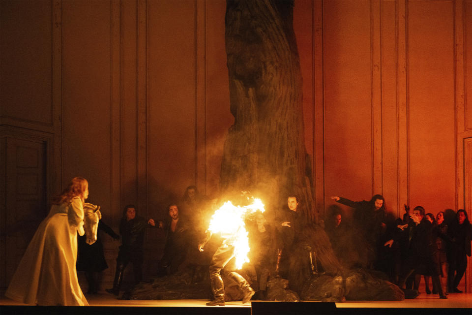 This image released by the Zurich Opera shows Camilla Nylund, left, as Brünnhilde in a rehearsal of Andreas Homoki’s production of Wagner’s “Götterdämmerung” at the Zurich Opera. (Monika Rittershaus/Zurich Opera via AP)
