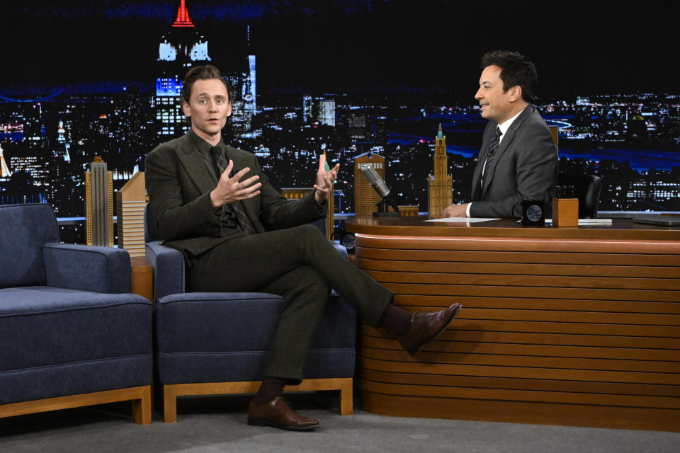 THE TONIGHT SHOW STARRING JIMMY FALLON -- Episode 1873 -- Pictured: (l-r) Actor Tom Hiddleston during an interview with host Jimmy Fallon on Friday, November 10, 2023 -- (Photo by: Todd Owyoung/NBC via Getty Images)