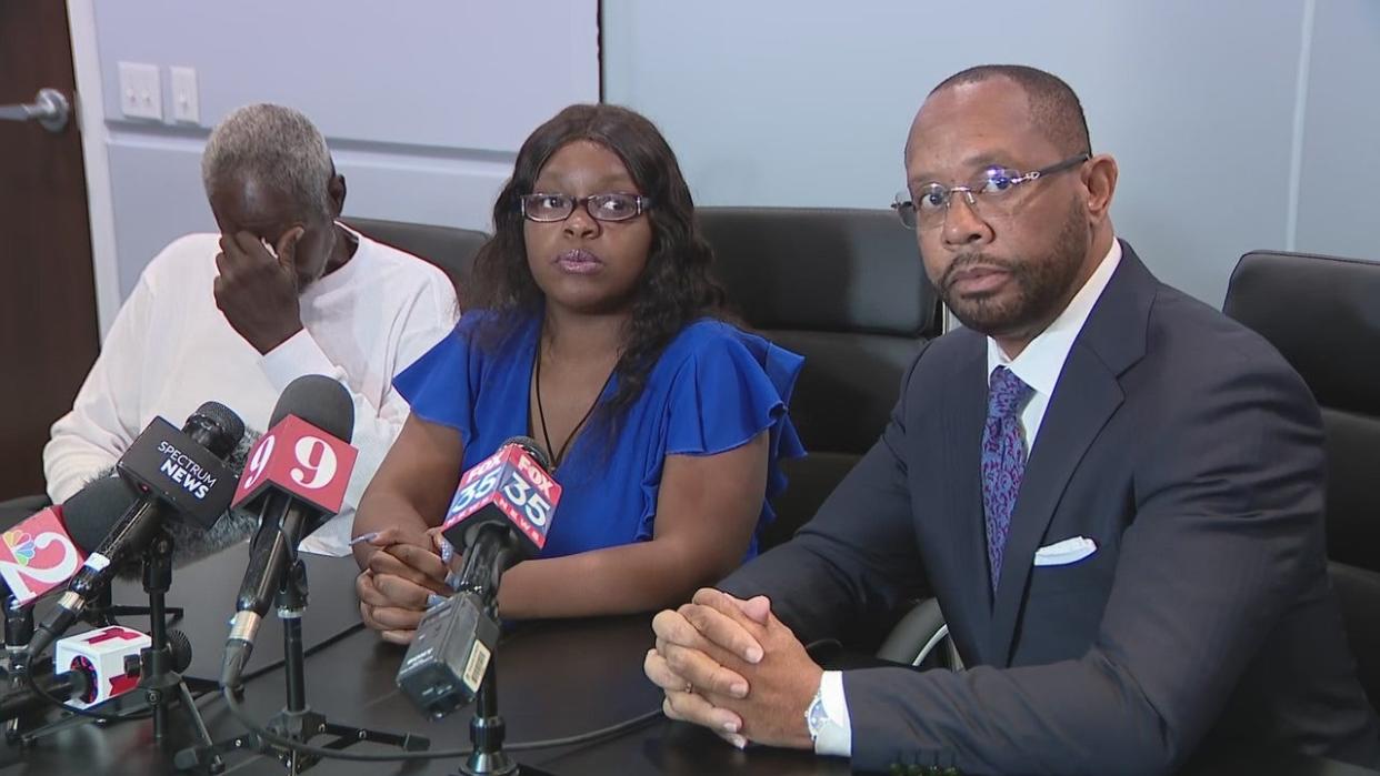 <div>Ronald Sanders (left), Victoria O'Neal (middle), and attorney Greg Francis (right) held a press conference on May 1, 2024. The family is demanding answers after their 15-year-old son died after suffering a medical emergency on an Orange County Public Schools school bus on April 29, 2024.</div>