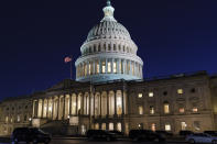 The Capitol is seen at dusk as work in the Senate is stalled on the Democrats' $1.9 trillion COVID-19 relief bill, in Washington, Friday, March 5, 2021. Senators plan to continue to vote on amendments through the night. (AP Photo/J. Scott Applewhite)