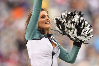 <p>An Eagles cheerleader performs in the rain during the NFL game between the San Francisco 49ers and the Philadelphia Eagles on October 29, 2017 at Lincoln Financial Field in Philadelphia PA. (Photo by Gavin Baker/Icon Sportswire via Getty Images) </p>