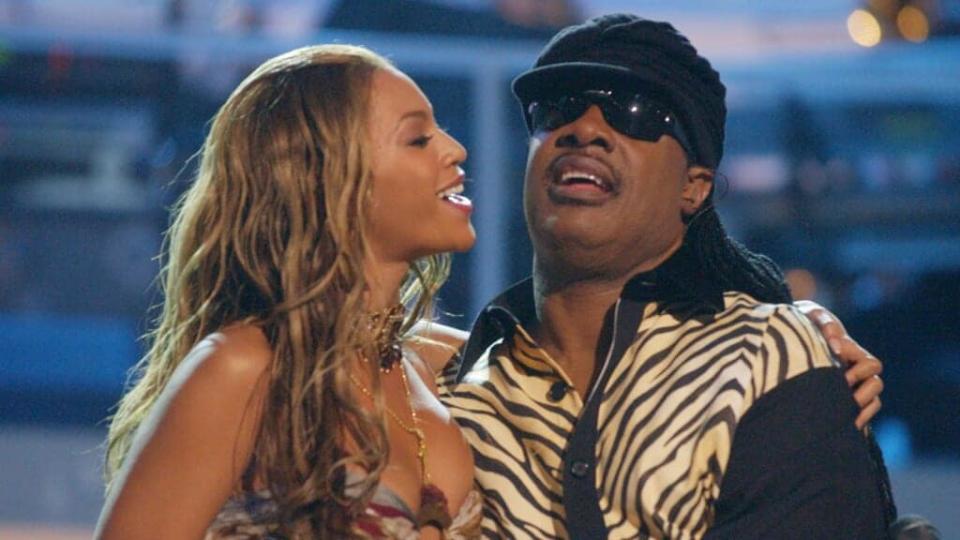 In this photo from 2003’s “VH1 Divas Duets,” superstars Beyonce (left) and Stevie Wonder (right) perform at the concert to benefit the VH1 Save the Music Foundation held at the MGM Grand Garden Arena in Las Vegas, Nevada. (Photo by Frank Micelotta/Getty Images)