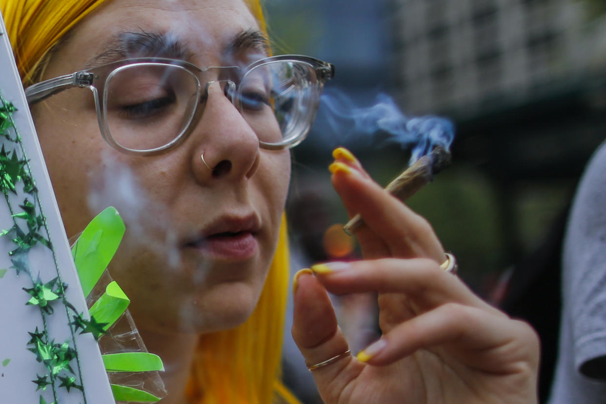 A woman smokes a joint as he attends the World March for Cannabis legalization on May 5, 2018 in Manhattan, New York . (Photo by Eduardo MunozAlvarez/VIEWpress/Corbis via Getty Images)