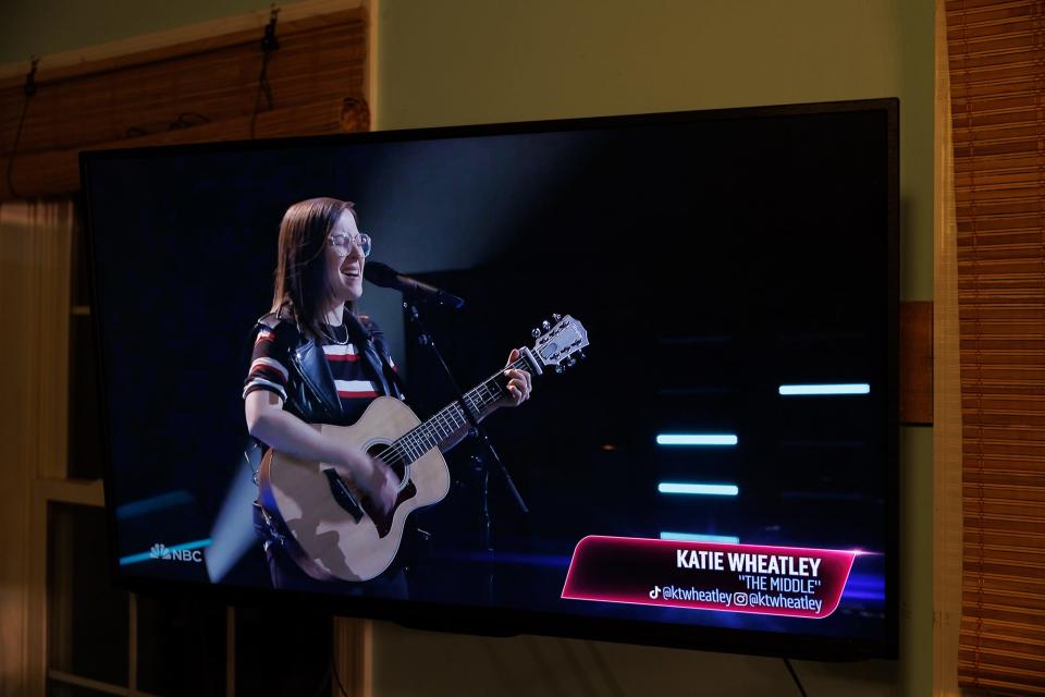 Katie Wheatley is seen on a television performing on NBC's 'The Voice' during the show's blind auditions, Monday, Oct. 16, 2023.