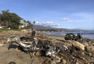 <p>The wreckage of two autos sits on the beach that were carried by floodwaters down Montecito Creek Tuesday all the way to the Pacific Ocean in Montecito, Calif., Wednesday, Jan. 10, 2018. (Photo: Mike Eliason/Santa Barbara County Fire Department via AP) </p>