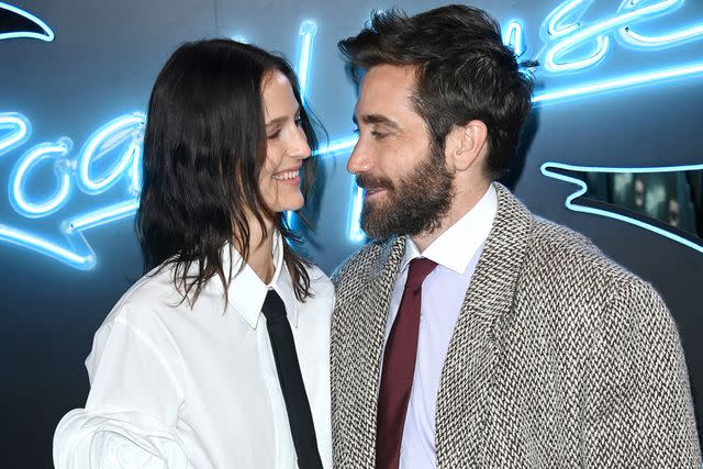 <p>Stuart C. Wilson/Getty Images</p> Jeanne Cadieu and Jake Gyllenhaal attend a screening of <em>Road House</em> in London on March 14, 2024