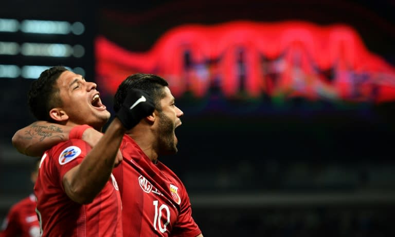 Shanghai SIPG forward Hulk (right) and teammate Elkeson celebrate a goal during their AFC Asian Champions League match against Urawa Red Diamonds in Shanghai on March 15, 2017