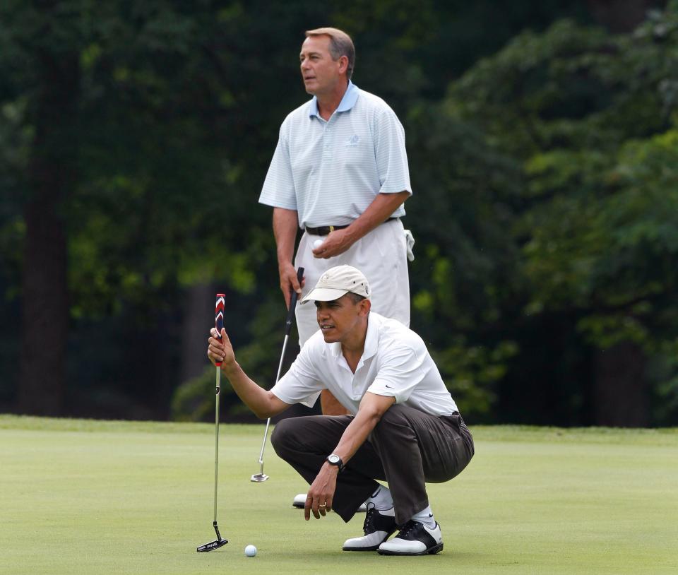 President Barack Obama and House Speaker John Boehner, R-Ohio, are on the first hole as they play golf at Andrews Air Force Base, Md.,  Saturday, June 18, 2011. 