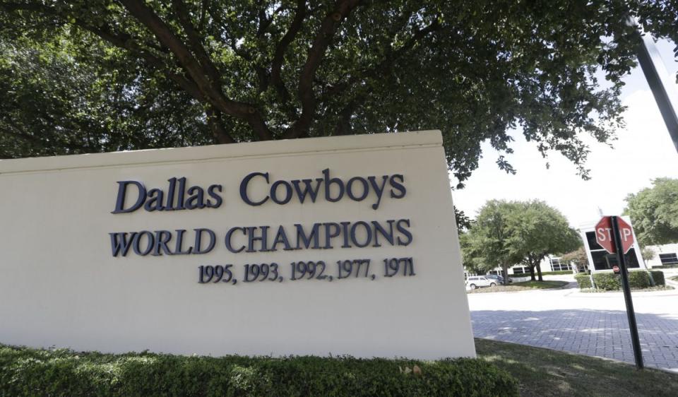 A sign marks the entrance to the Cowboys' soon-to-be-former headquarters at Valley Ranch. (Associated Press)