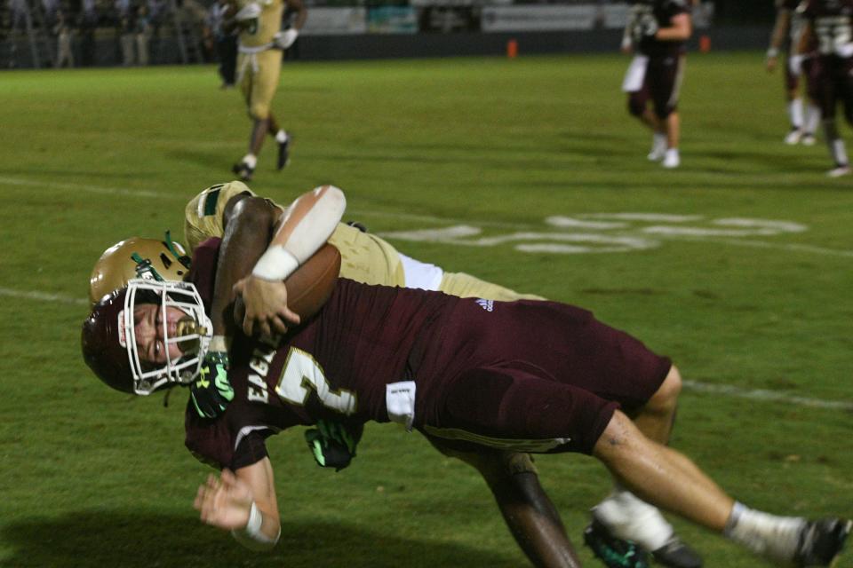 Niceville High School's Maddax Fayard is taken down by a Lincoln defender during Friday's Kickoff Classic against Lincoln High School  at Niceville.