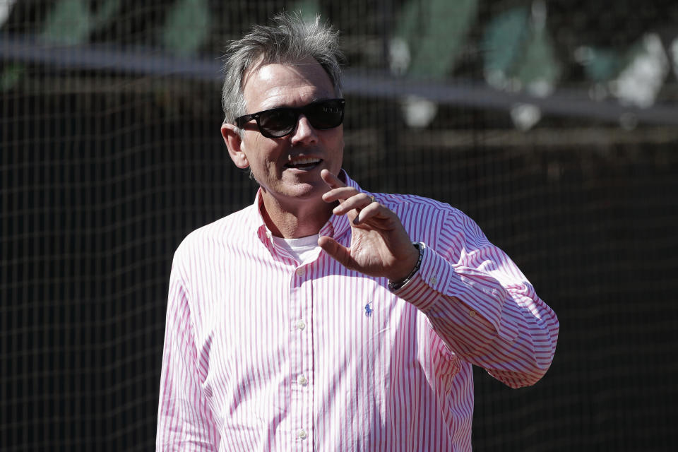 Oakland Athletics Executive Vice President of Baseball Operations Billy Beane watches baseball practice in Oakland, Calif., Tuesday, Oct. 1, 2019. The Athletics are scheduled to face the Tampa Bay Rays in an American League wild-card game Wednesday, Oct. 2. (AP Photo/Jeff Chiu)