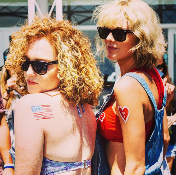 Everyone saw Hiddleston’s “I  T.S.” tank and heart tattoo. Those creative minds were all about the temporary tats — here’s Taylor modeling her own “T” alongside Anderson, who captioned the shot “Taymerica.” (Photo: Instagram)