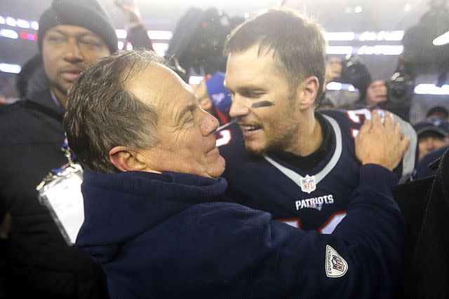 Stan Grossfeld/The Boston Globe via Getty Images Bill Belichick; Tom Brady