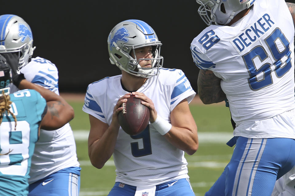 Detroit Lions quarterback Matthew Stafford (9) looks for a receiver during the first half of an NFL football game against the Jacksonville Jaguars, Sunday, Oct. 18, 2020, in Jacksonville, Fla. (AP Photo/Stephen B. Morton)