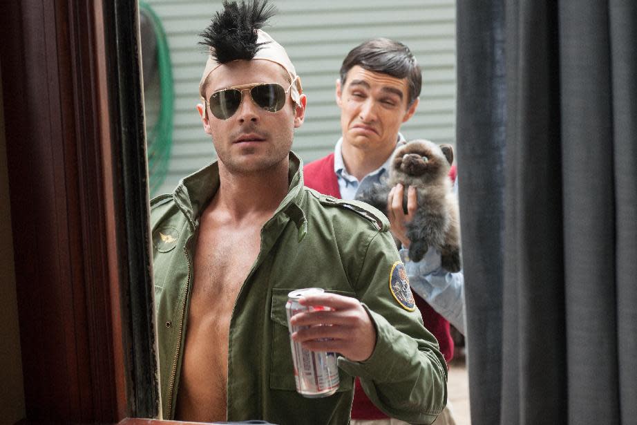 This image released by Universal Pictures shows Zac Efron, left, and Dave Franco in a scene from the film, "Neighbors." (AP Photo/Universal Pictures, Glen Wilson)