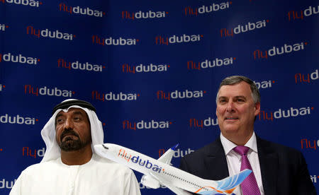 Flydubai and Emirates Chairman Sheikh Ahmed bin Saeed al-Maktoum and Boeing Commercial Airplanes President & Chief Executive Kevin McAllister attend a news conference at the Dubai Airshow in Dubai, UAE November 15, 2017. REUTERS/Satish Kumar