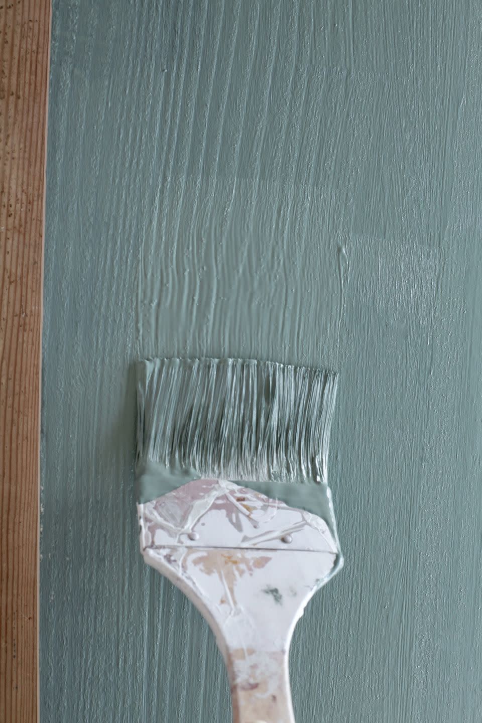 <p>Measure the length of your shelves to establish how long your scalloped edge trim needs to be. Then prime and paint your shelves. Jen used the <a href="https://www.homebase.co.uk/house-beautiful-durable-matt-emulsion-multi-surface-paint-back-to-nature-bn.42-2.5l/13419365.html" rel="nofollow noopener" target="_blank" data-ylk="slk:House Beautiful Back to Nature BN.42 paint at Homebase;elm:context_link;itc:0;sec:content-canvas" class="link ">House Beautiful Back to Nature BN.42 paint at Homebase</a>. Remember that any paintbrush streaks or bubbling in your paint can easily be sanded down. </p>