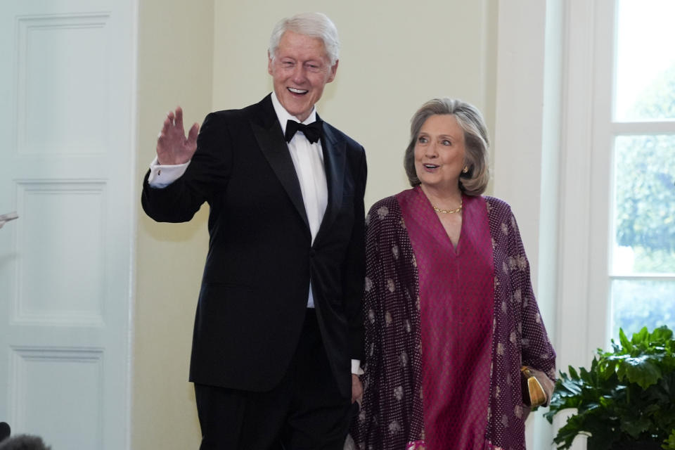 Former President Bill Clinton and former Secretary of State Hillary Rodham Clinton, arrive at the Booksellers area of the White House for the State Dinner hosted by President Joe Biden and first lady Jill Biden for Japan's Prime Minister Fumio Kishida, and wife Kishida Yuko, Wednesday, April 10, 2024, in Washington. (AP Photo/Jacquelyn Martin)