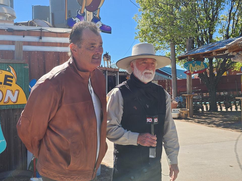 Starlight Ranch co-owner Bobby Lee, left, and music artist Michael Martin Murphey speak at news conference Wednesday about the upcoming benefit performance of Lyle Lovett and Murphey. The Rangeland Fire Relief Benefit Dinner and Concert will be held April 21 at the Starlight Ranch.