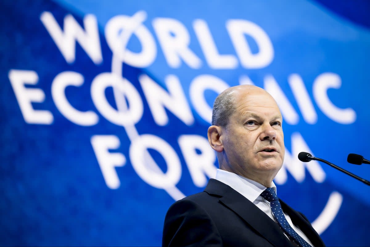 German Chancellor Olaf Scholz addresses a plenary session during the 51st annual meeting of the World Economic Forum (Laurent Gillieron / EPA)