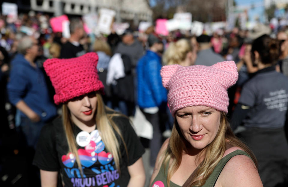 People wear pink hats while protesting newly inaugurated President Donald Trump during a women's march Saturday, Jan. 21, 2017, in Las Vegas. 