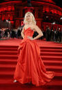 <p>Karlie Kloss went for Old Hollywood glam in a structured red gown. (Photo: Getty Images) </p>