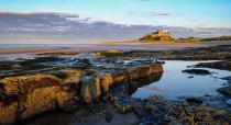 This Northumberland based beach has everything: sand dunes, spectacular views and even an 18th century castle. Voted one of the North East's best surf spots, this location is worth the journey. [Photo: Getty]