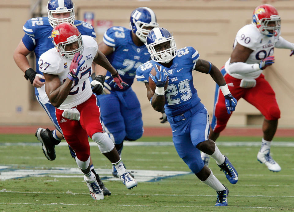 Sep 13, 2014; Durham, NC, USA; Duke Blue Devils running back Shaun Wilson (29) runs for a touchdown against the Kansas Jayhawks at Wallace Wade Stadium. (Mark Dolejs-USA TODAY Sports)