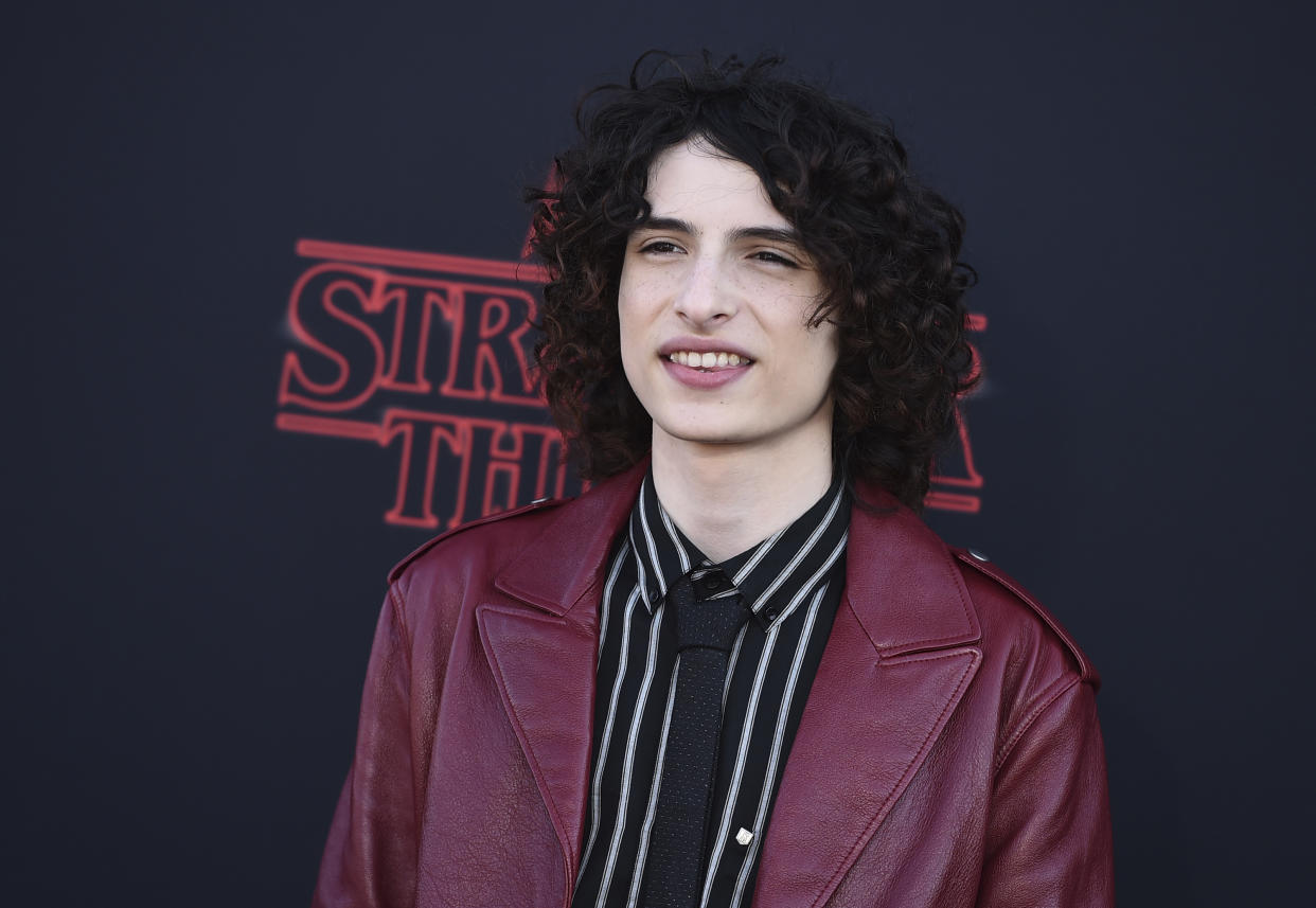 Finn Wolfhard arrives at the season three premiere of "Stranger Things" at Santa Monica High School on Friday, June 28, 2019, in Santa Monica, Calif. (Photo by Jordan Strauss/Invision/AP)