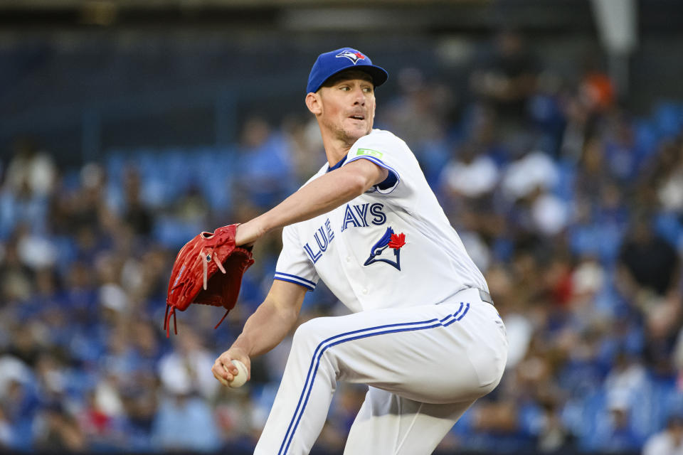 Toronto Blue Jays starting pitcher Chris Bassitt works against the Cleveland Guardians during the first inning of a baseball game Friday, Aug. 25, 2023, in Toronto. (Christopher Katsarov/The Canadian Press via AP)