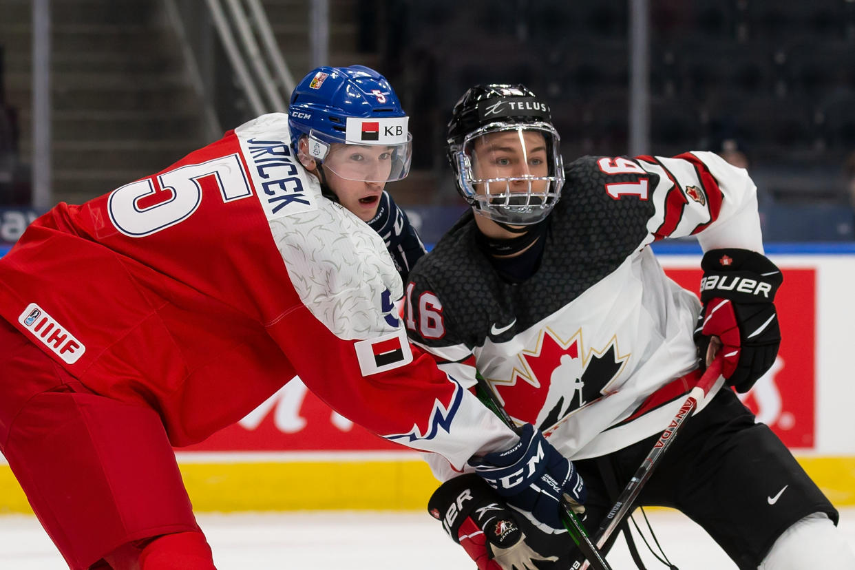 EDMONTON, AB - DECEMBER 26: Connor Bedard #16 of Canada battles against David Jiricek #5 of Czechia in the first period during the 2022 IIHF World Junior Championship at Rogers Place on December 26, 2021 in Edmonton, Canada. (Photo by Codie McLachlan/Getty Images)