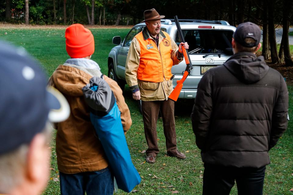 Instructor Jim Vihtelic talks about firearm safety during a hunter safety course at the Western Wayne County Conservation Association in Plymouth on Oct. 8, 2022.