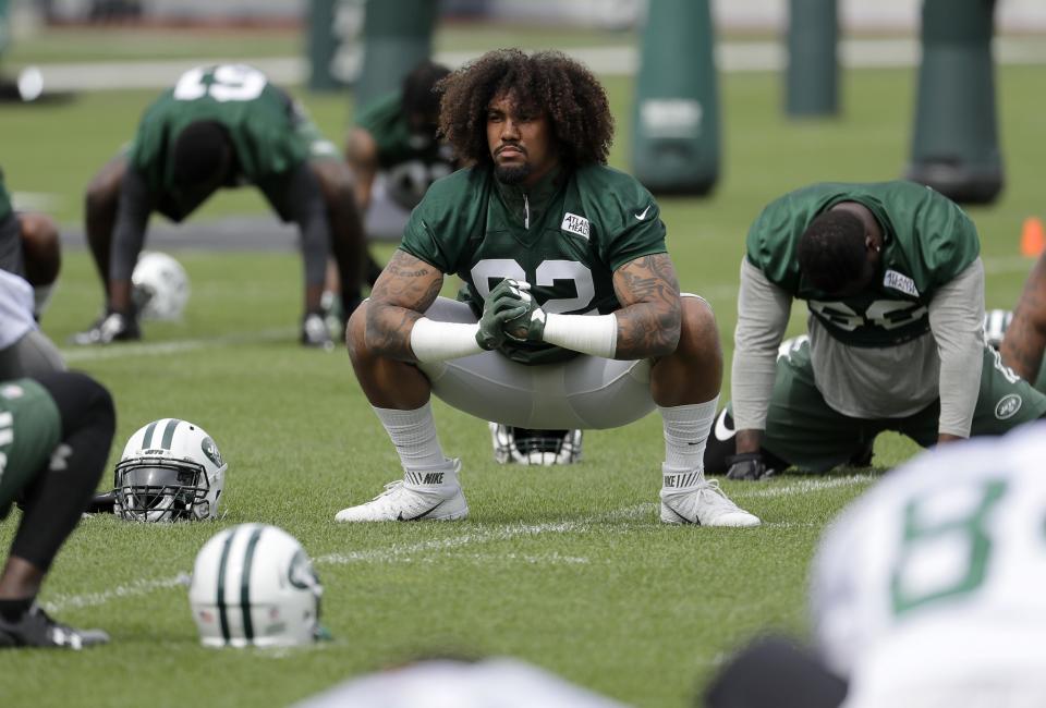 New York Jets defensive lineman Leonard Williams (middle) reportedly was in a video pushing teammate Darron Lee away from an altercation. (AP)