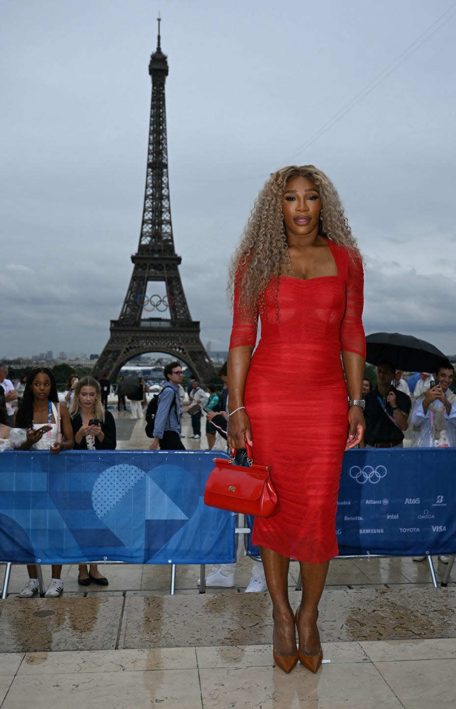 us tennis player serena williams arrives ahead of the opening ceremony of the paris 2024 olympic games in paris on july 26, 2024, as the eiffel tower is seen in the background photo by jonathan nackstrand afp photo by jonathan nackstrandafp via getty images